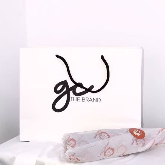Bolsa de papel de marfil personalizada para regalo, color blanco, 220GSM, bolsa de asas para tienda de tela